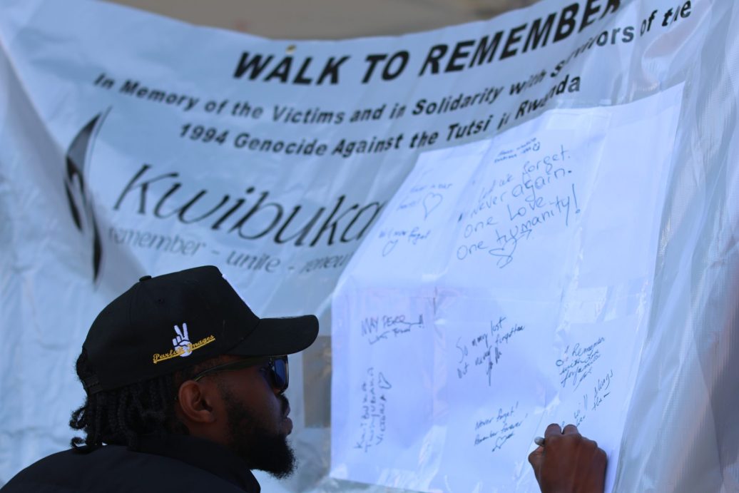 advocate write a memorial message on the white banner